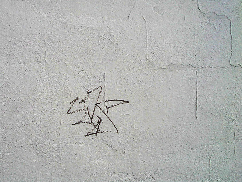 Star on White Wall